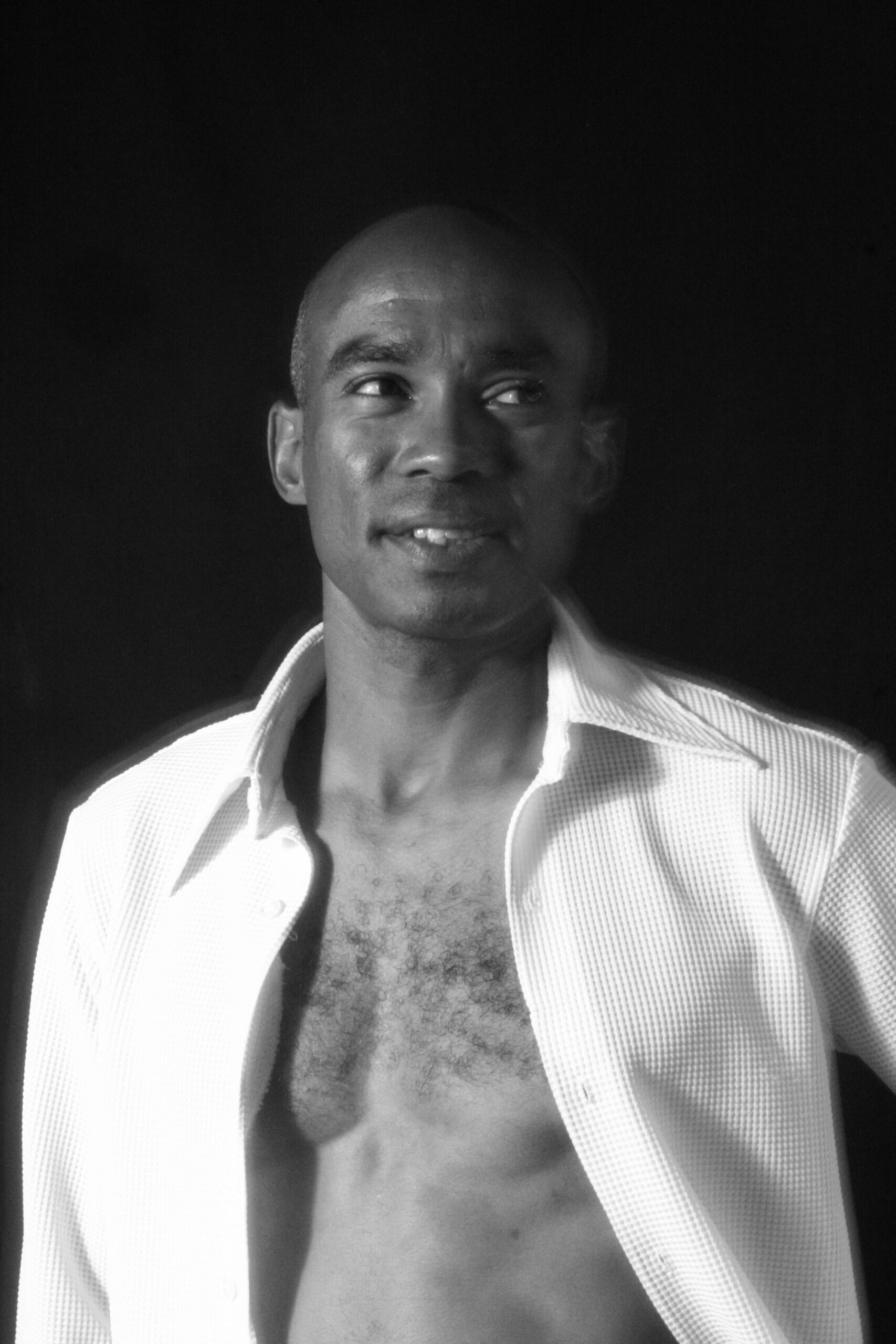 Smiling man in black and white